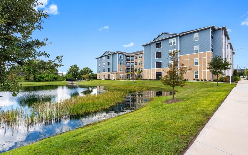 a large building by a body of water