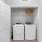 washer and dryer in a closet