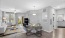 living area with couch, tv, and dining area